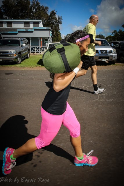 CrossFit competition sand bag carry